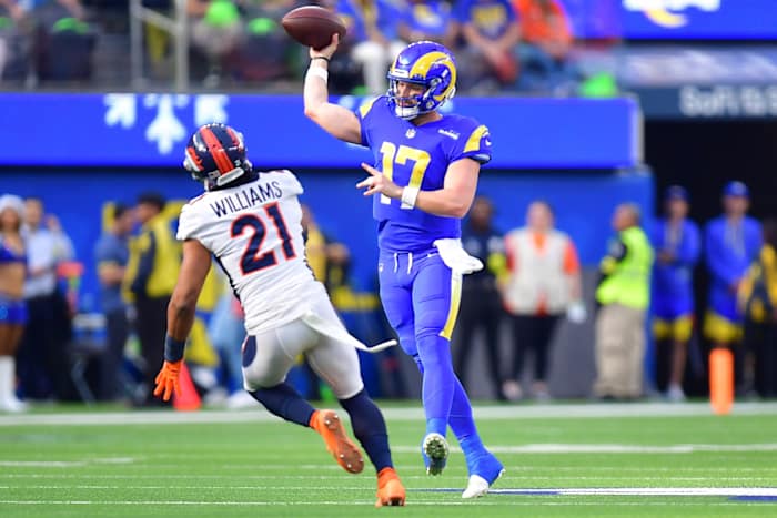 Dec 25, 2022; Inglewood, California, USA; Los Angeles Rams quarterback Baker Mayfield (17) throws against Denver Broncos cornerback K'Waun Williams (21) during the first half at SoFi Stadium. Mandatory Credit: Gary A. Vasquez-USA TODAY Sports  